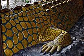 Yangon Myanmar. Shwedagon Pagoda (the Golden Stupa). Balustrade of the southern stairway sculptured in the shape of a crocodile. 